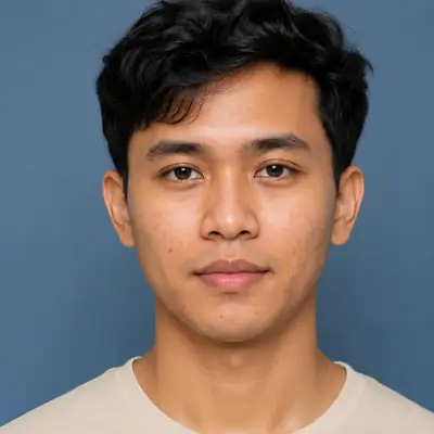Close-up portrait of a young man with facial skin blemishes and acne scars