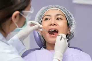 Routine Dental Checkup and Oral Examination in Clinic Stock Photo