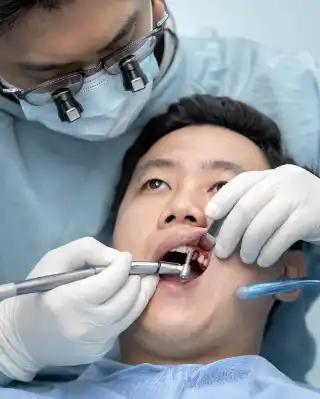 Dental Implant Placement Surgery in Front Teeth - Clinical Dentistry Photo