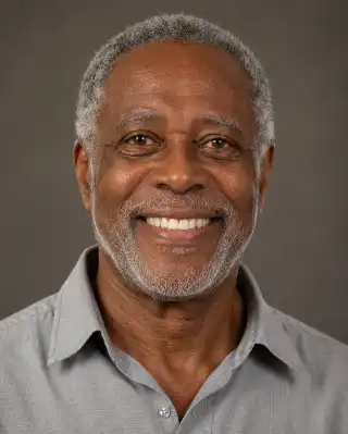 Elderly Man Smiling Showing Dentures Portrait - Dental Health Stock Photo